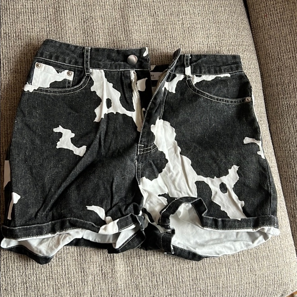 Cow print jean shorts